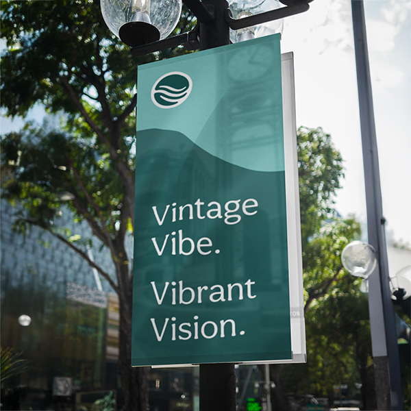 Street banner reading "Vintage vibe, vibrant vision."