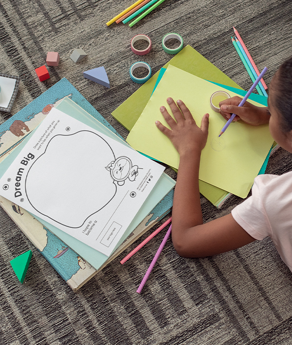 Child with coloring page