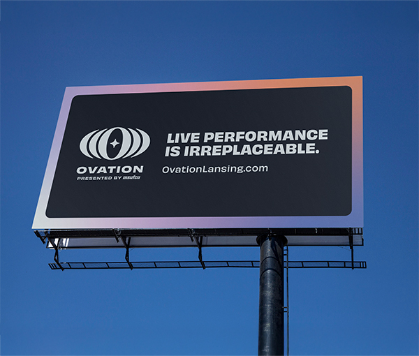 Billboard reading "Live performance is irreplaceable. OvationLansing.com" 