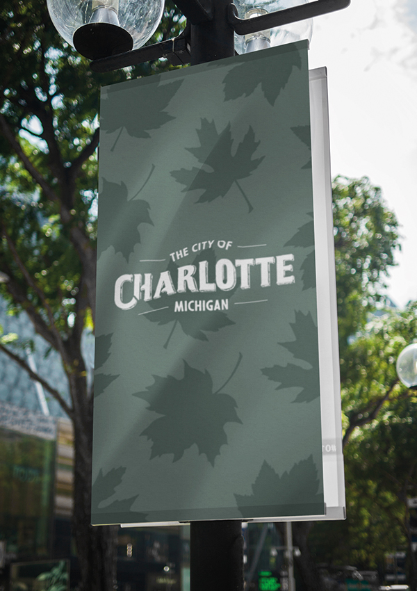 Streetlight signage featuring the Charlotte brand