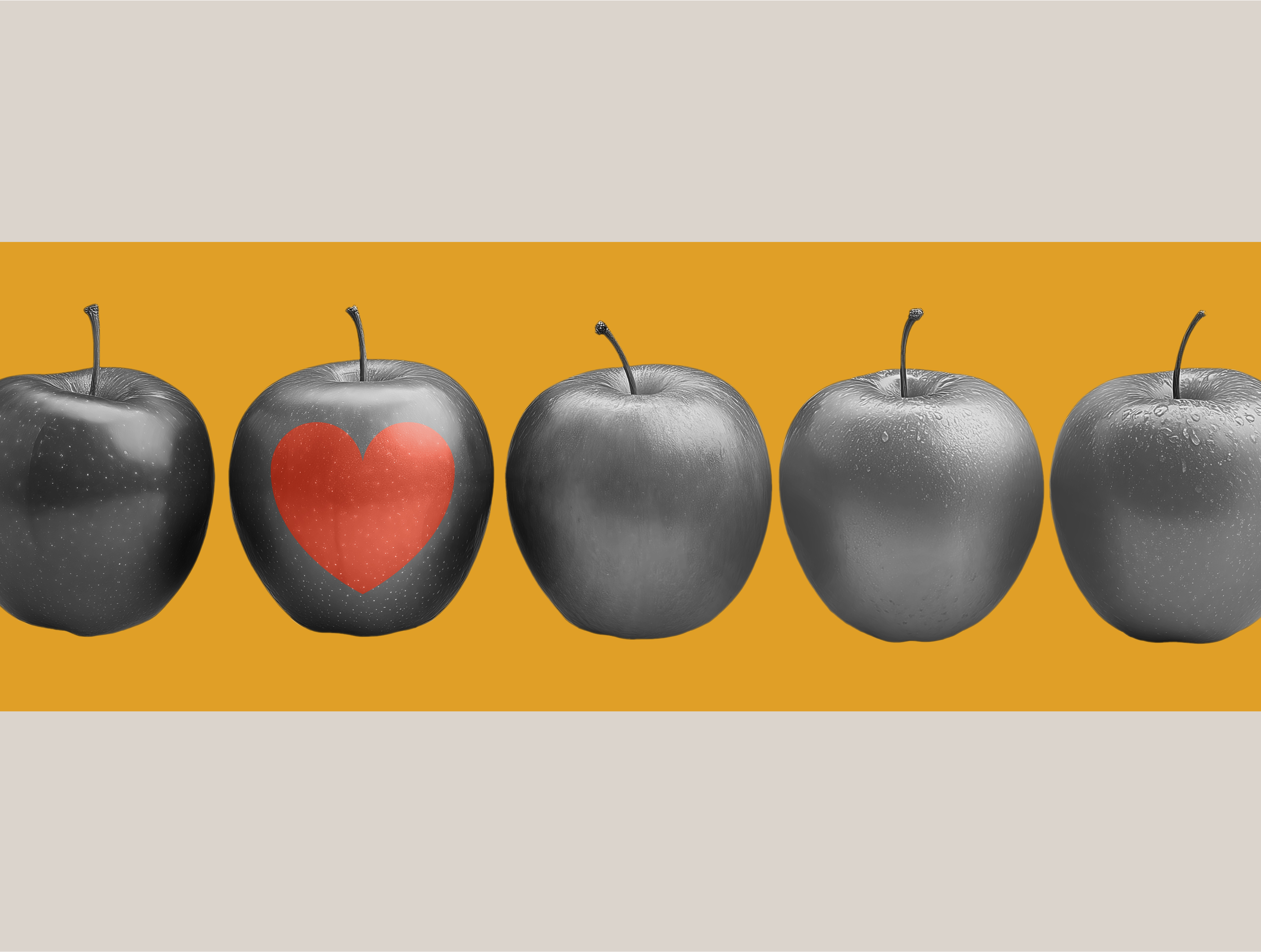 In a row of black-and-white apples, one has a red heart, meant to symbolize brand awareness. 
