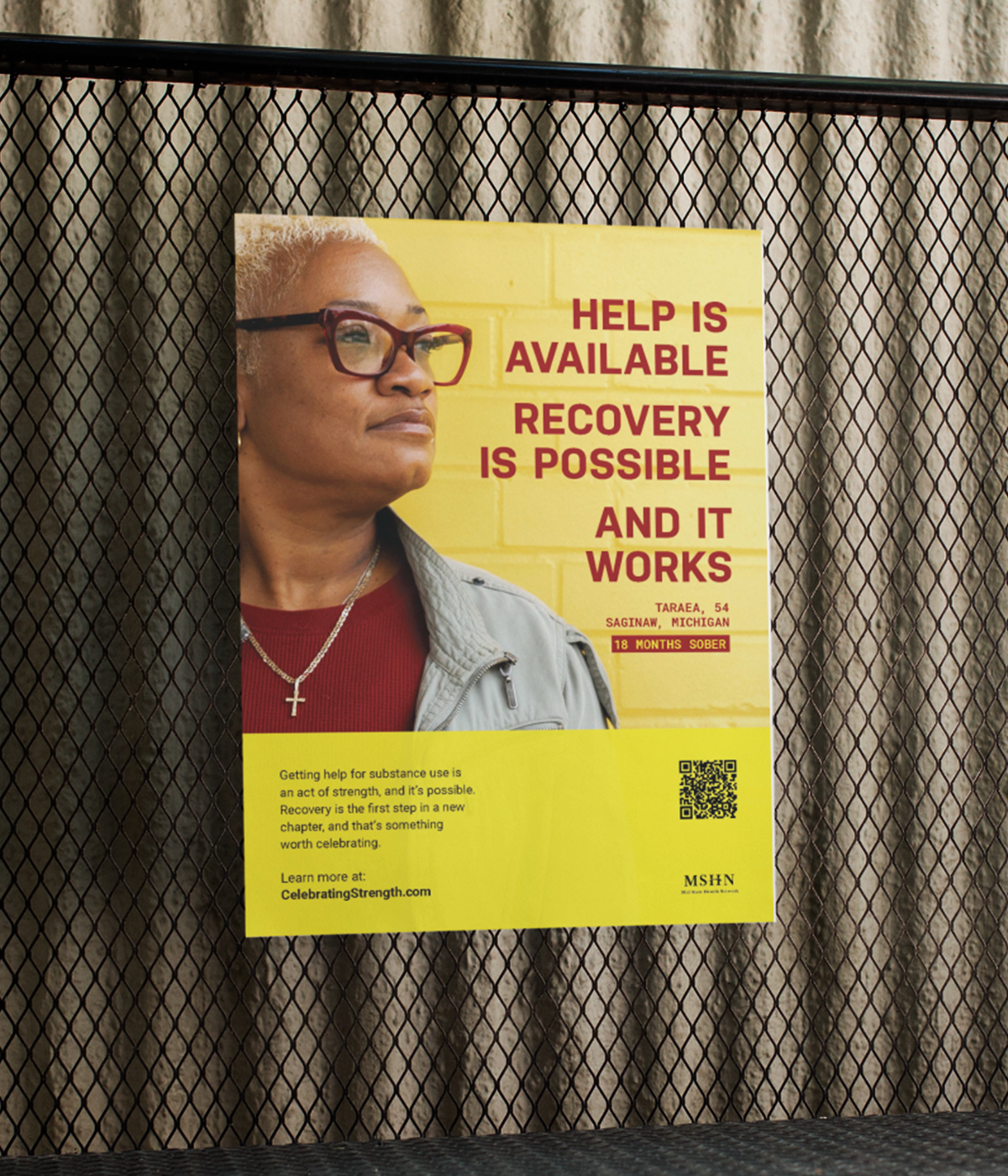 A poster of a woman reads "Help is available. Recovery is possible. And it works." 